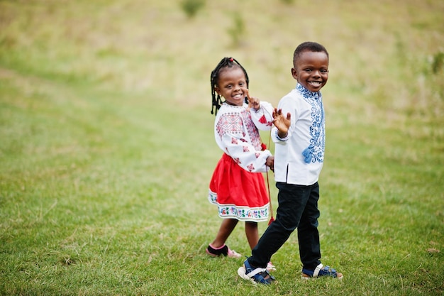 African kids in traditional clothes at park