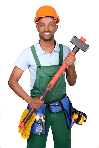 African male worker carrying toolbox