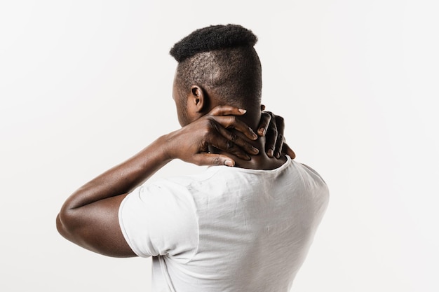 Premium Photo | African man feel spine and neck pain because of spinal ...