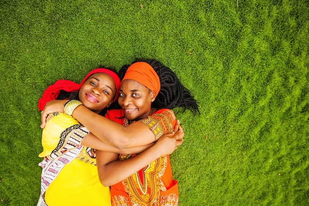 African mother and daughter on the grass