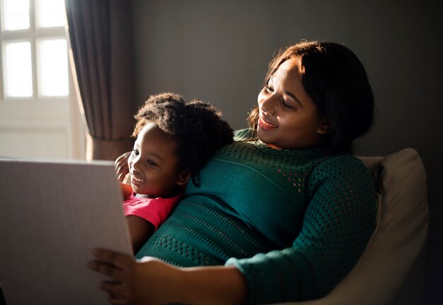 African mother and daughter having a good time together