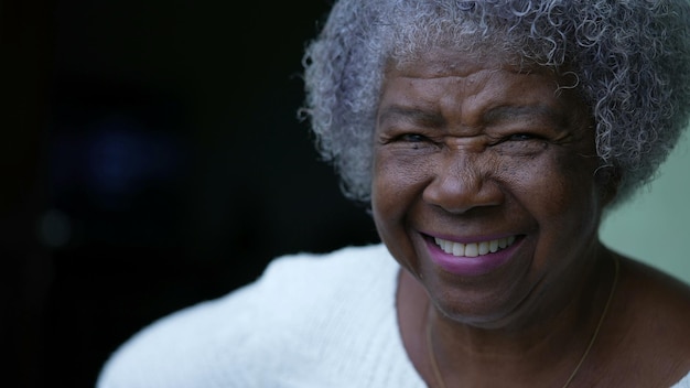 An African senior woman laughing and smiling portrait face