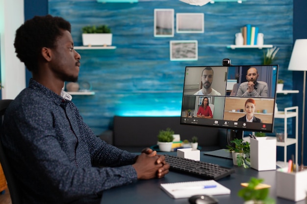 African teenager greeting discussing with school business team