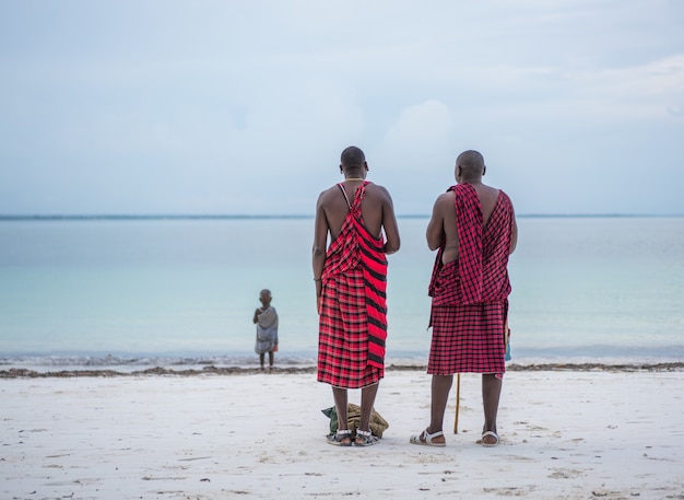 African tribe men on beach