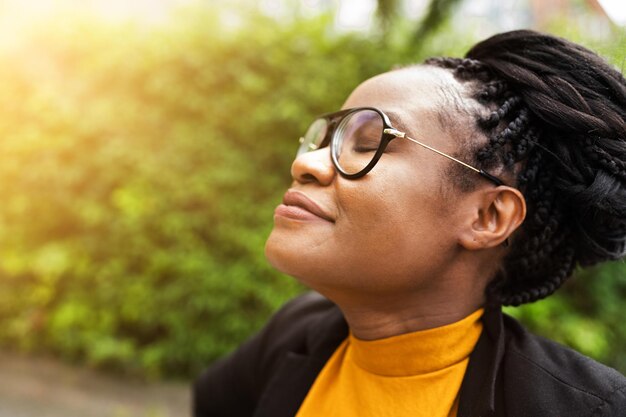 African woman breathing clean air