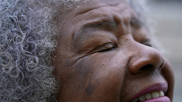 An african woman closing eyes in contemplation and
meditation