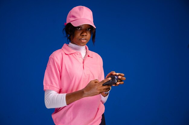 African woman using a point of sale device