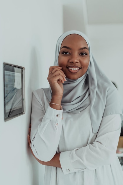 African woman using smart home screen control system