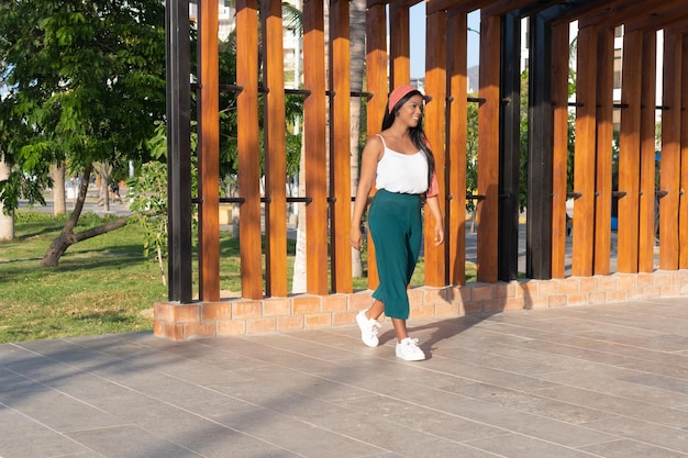 African woman walking through the streets of the city