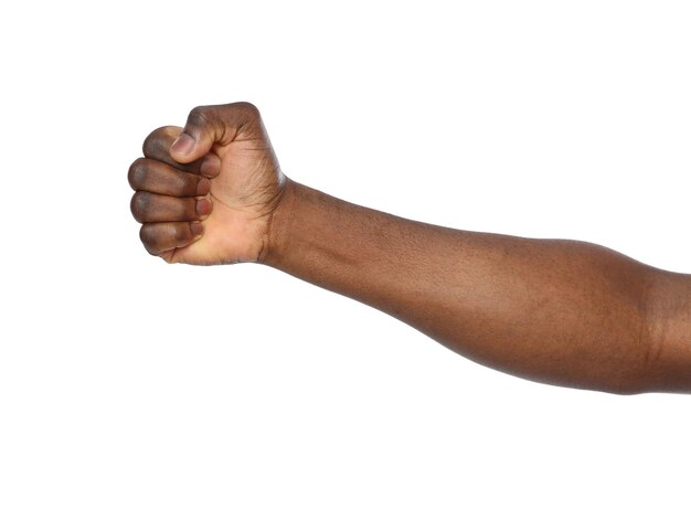 AfricanAmerican man showing fist on white background closeup