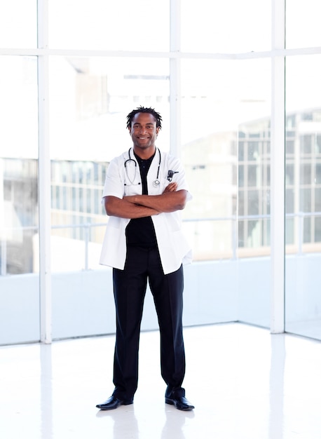 Afro-American doctor isolated with folded arms