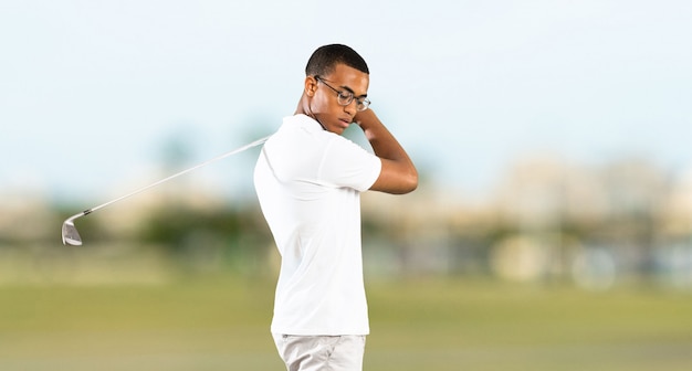 Afro American golfer player man at outdoors