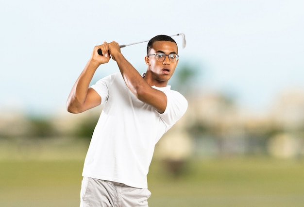 Afro American golfer player man at outdoors