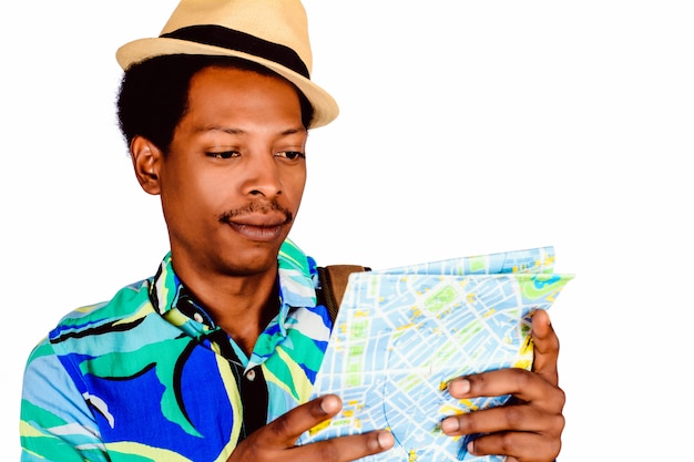 Afro american man holding map
