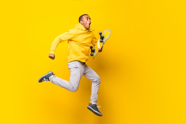 Afro American skater man over isolated white  