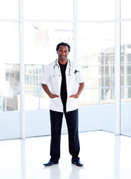 Afro-American smiling doctor isolated 