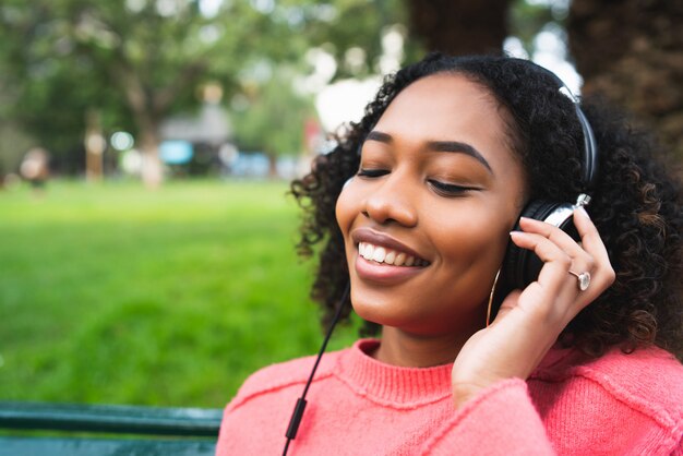 Afro american woman listening music