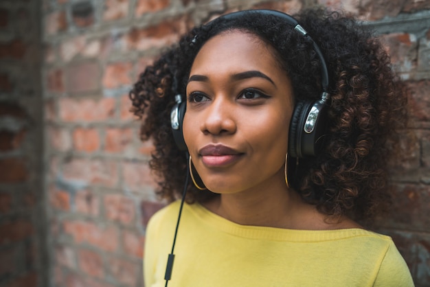 Afro american woman listening music