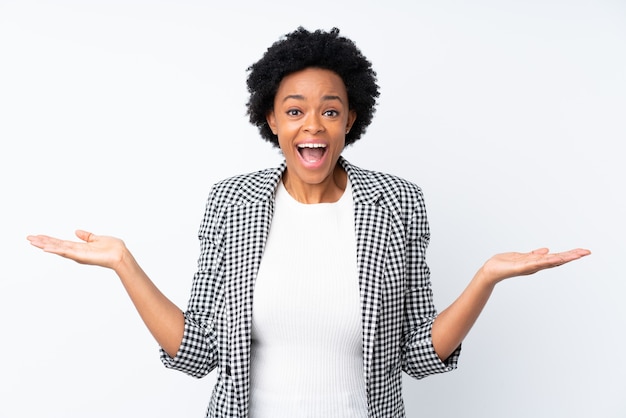 afro american woman rasing hands surprised isolated