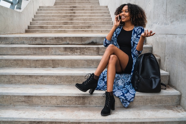 Afro american woman talking on the phone