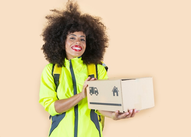 Afro american woman with box delivering