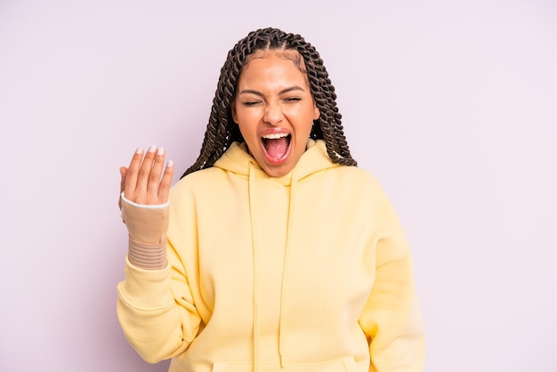 Afro black woman with braids broken hand concept