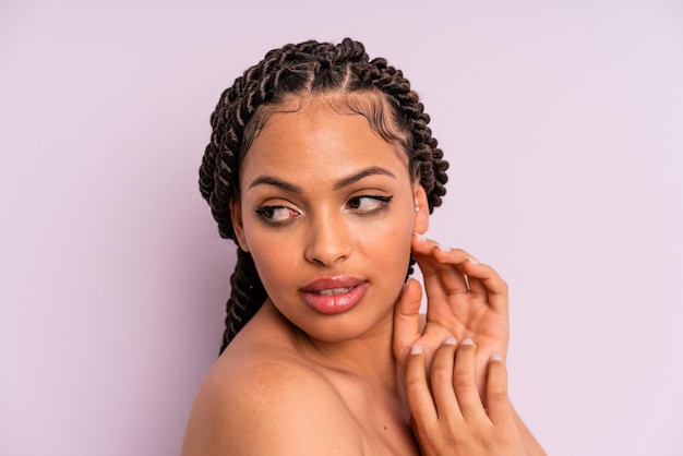 Afro black woman with braids close up beauty concept