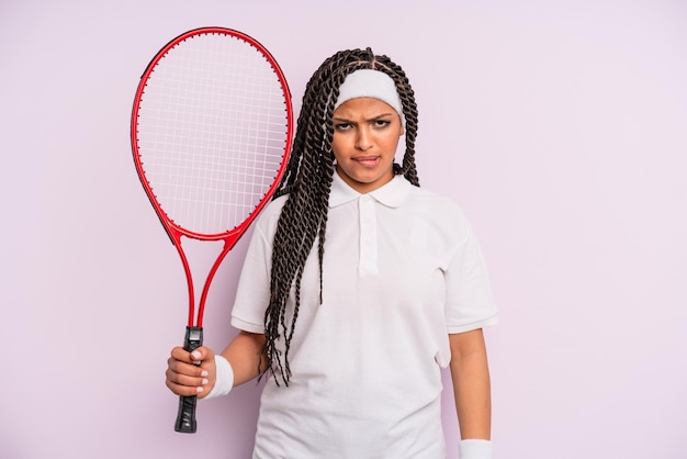 Afro black woman with braids tennis concept