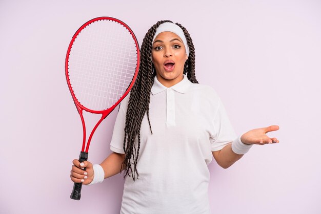 Afro black woman with braids tennis concept