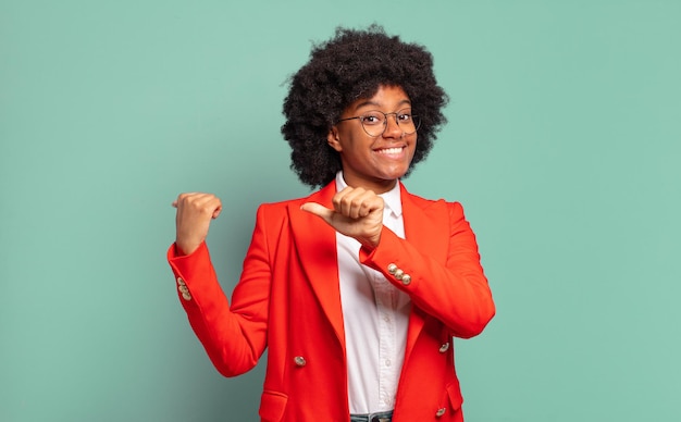 afro businesswoman with red blazer