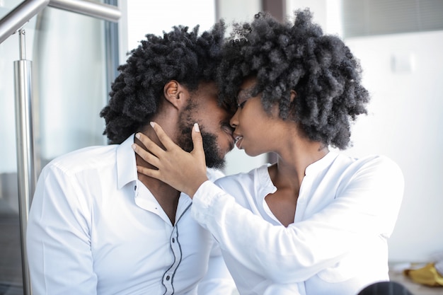 Afro couple kissing