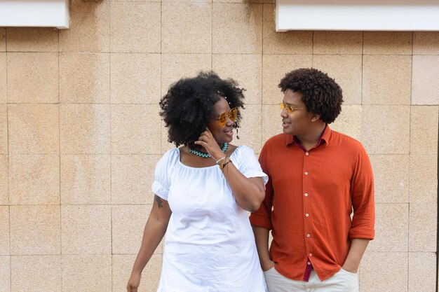 Afro couple spend free time in the city They are on vacation