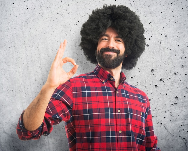 Afro man making OK sign