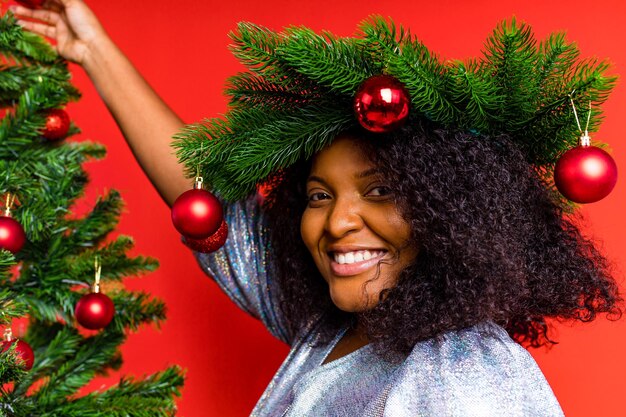 Afro spanish woman celebration christmas in silver dress