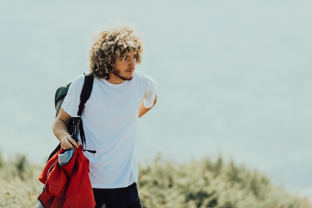 An afro teenager travels and explores nature during a corona virus pandemic