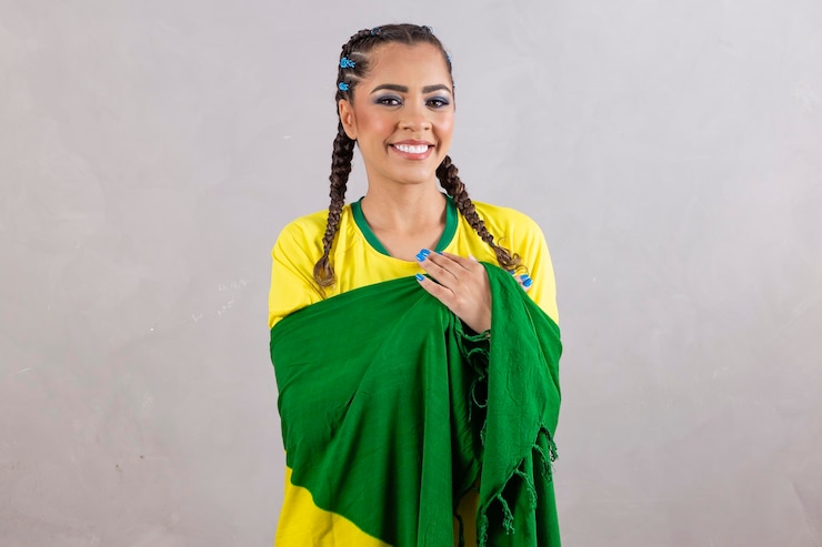 Afro woman with hand on heart with sign of gratitude and patriot September 7 Independence of Brazil
