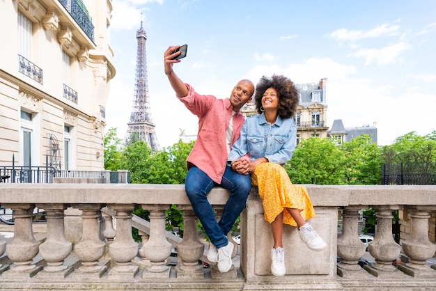 Afroamerican beautiful couple in love visiting Paris