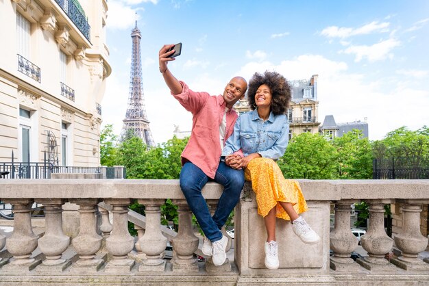 Afroamerican beautiful couple in love visiting Paris