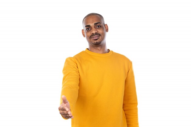 Afroamerican guy wearing a yellow sweatshirt