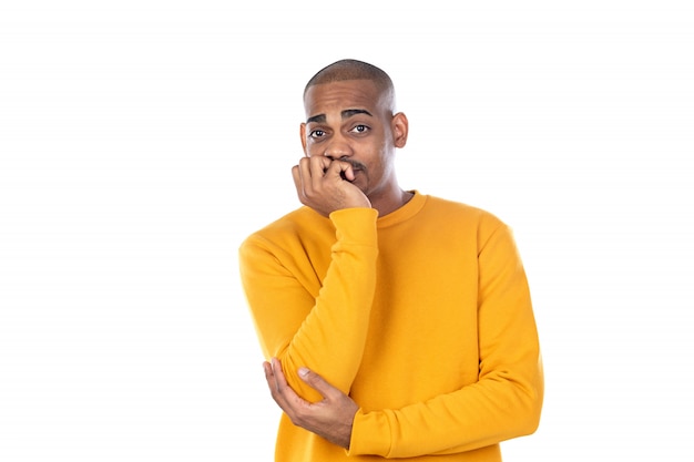 Afroamerican guy wearing a yellow sweatshirt