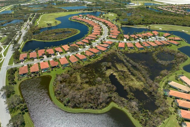 Aftermath of natural disaster Flooded houses by hurricane Ian rainfall in Florida residential area