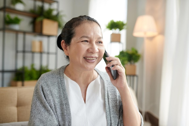 Aged Woman Talking on Phone