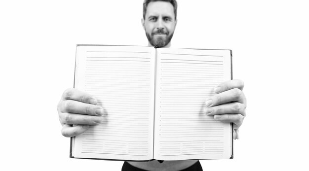 Agenda zakenman houdt notebook ceo vast met selectieve focus van notitieblok