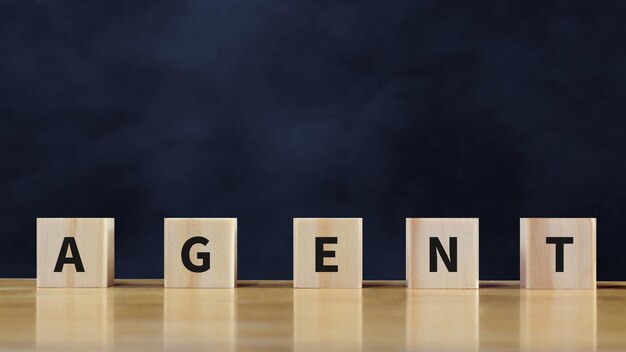 Photo agent word written with wooden cube