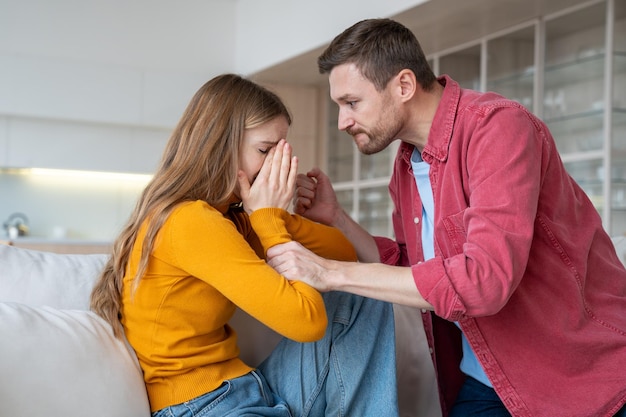 Photo aggressive husband ready to hit beat crying wife domestic violence harassment in family life