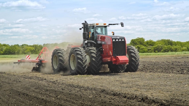 Agricultural machinery for plowing land Rural farming Plowing field