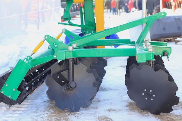 Agricultural machinery, sample of cultivator at the exhibition, agribusiness concept