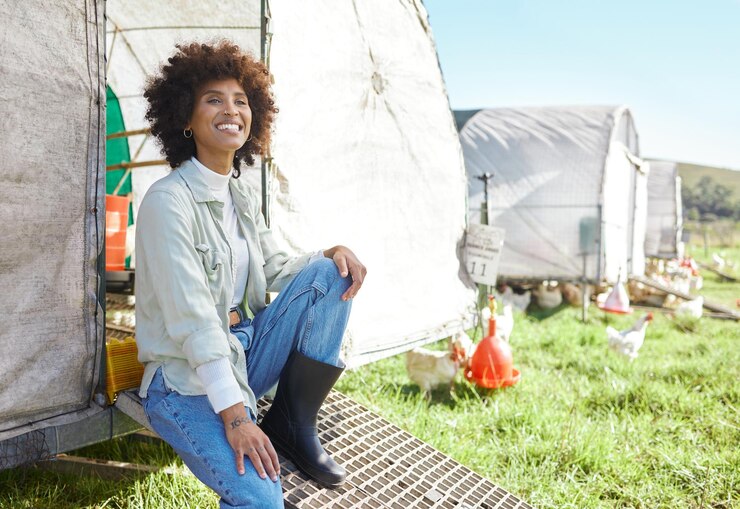 Photo agriculture farming and portrait of black woman on chicken barn or land for sustainability or free range food industry sustainable small business owner or farmer person with animal in countryside