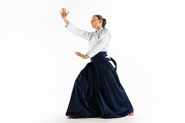 Aikido master practices defense posture.