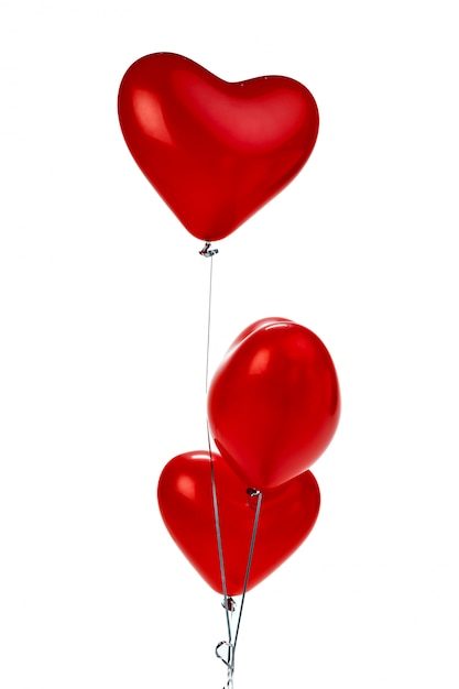 Air Balloons. Bunch of red heart shaped foil balloons